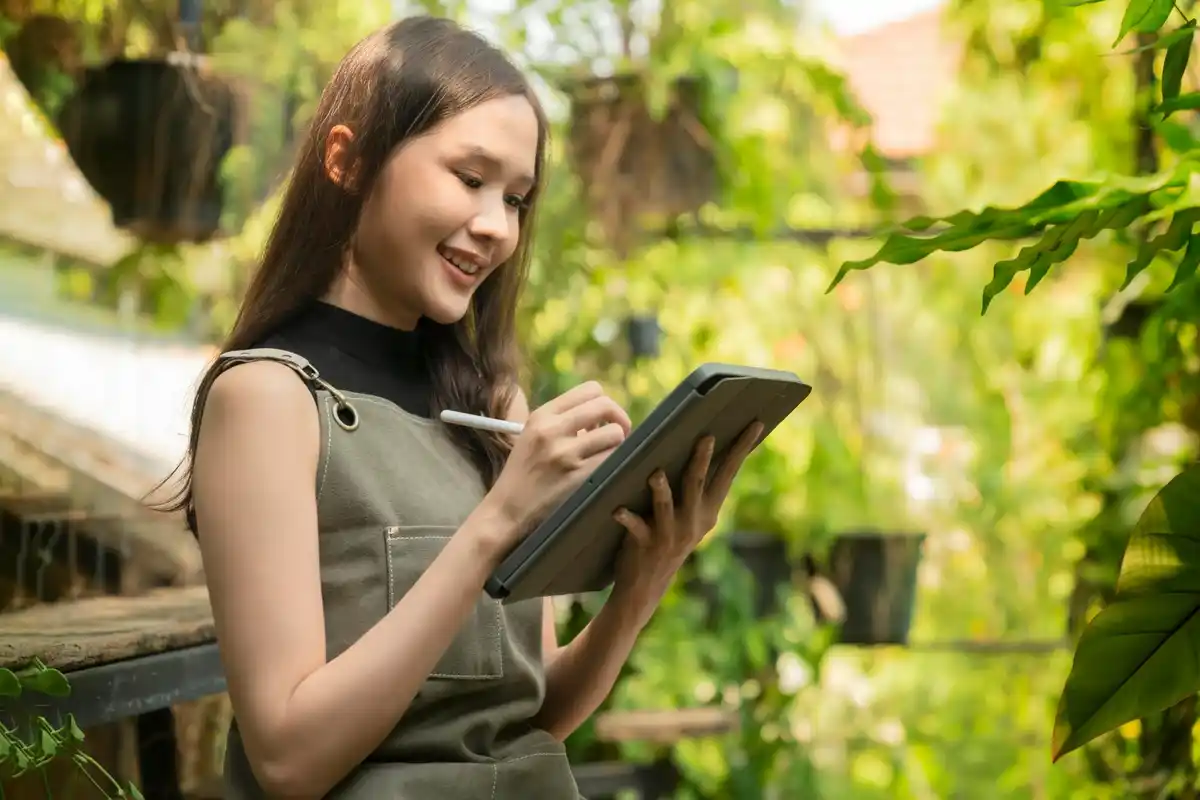 Smart gardening tools and apps in use