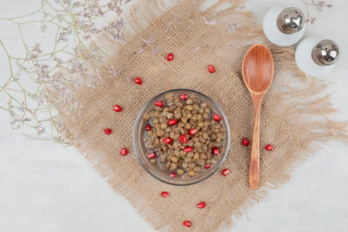 homemade vegetable seed saving on table with dried seeds
