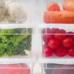 fresh carrots lettuce tomatoes storage kitchen fridge