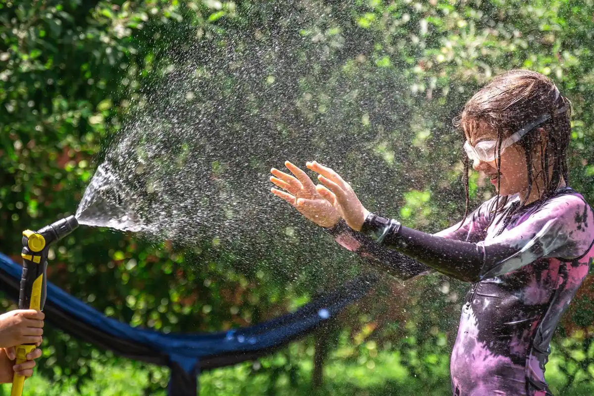 spring lawn watering garden hose