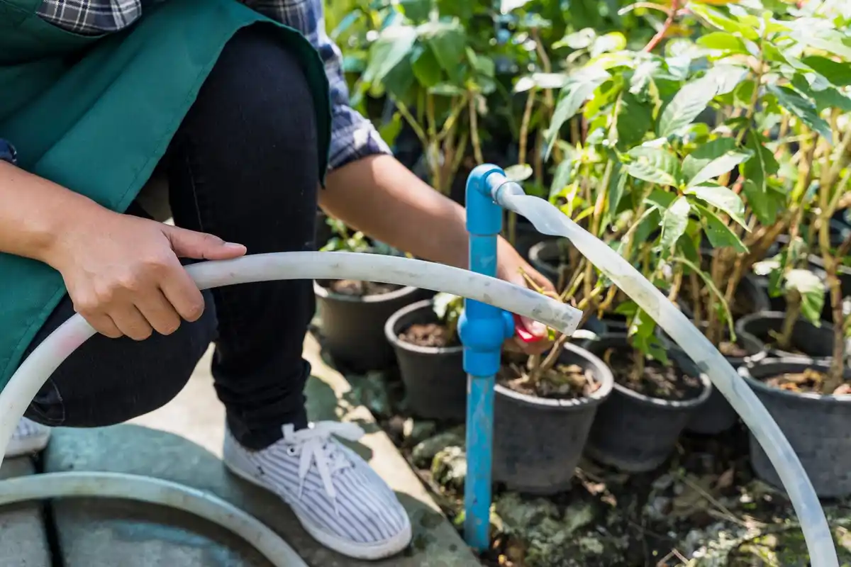 hose with smart irrigation controller in garden