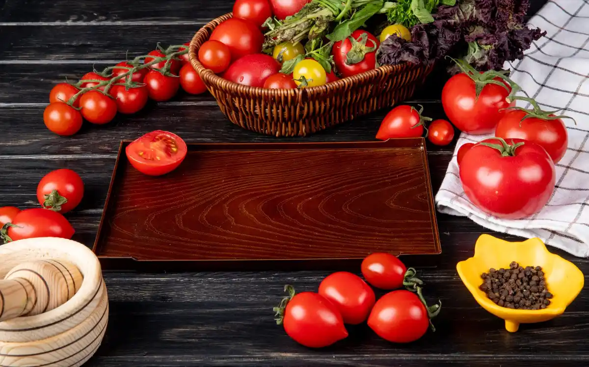 homegrown tomatoes with wooden support