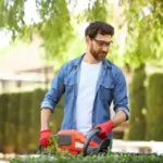 professional gardener lawn mower garden maintenance